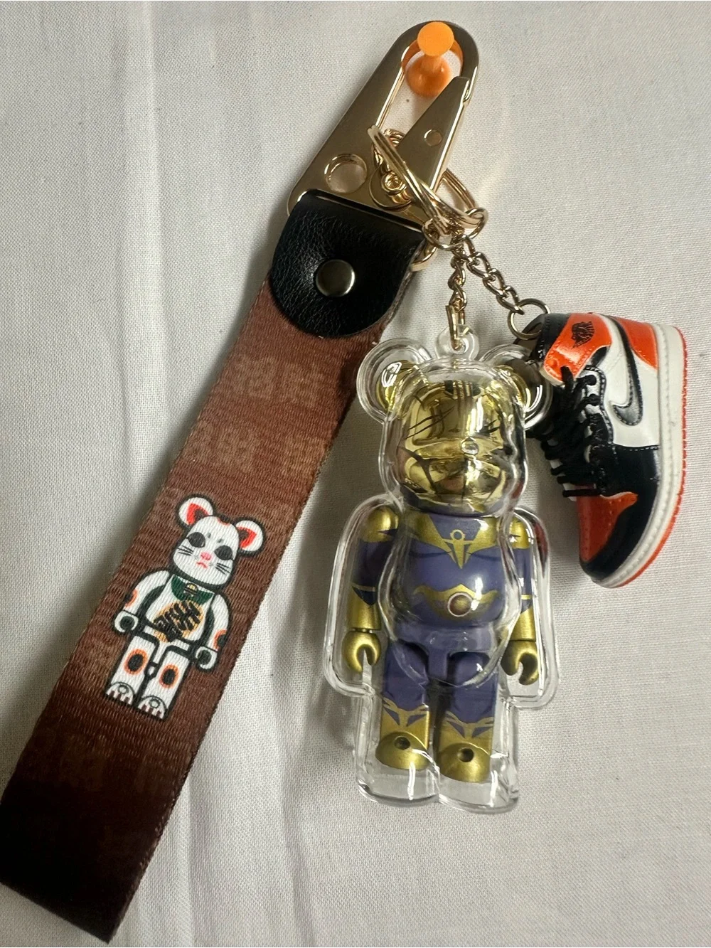 Gold & Purple Bear Keychain with Orange-Black Sneaker Charm